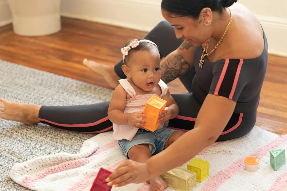 Parent and baby yoga session at home in London