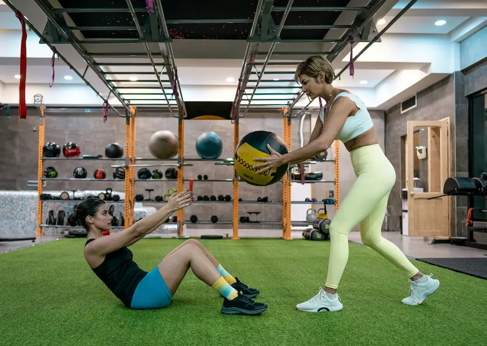 A SwimFitz coach working one-to-one with a client at home