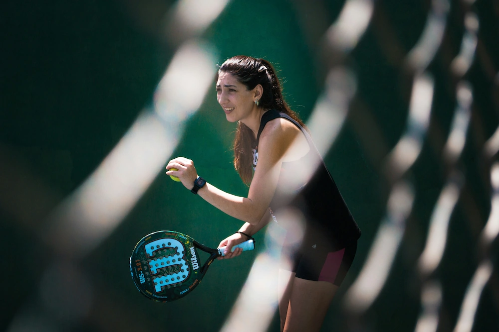 Private padel coaching session on a padel court